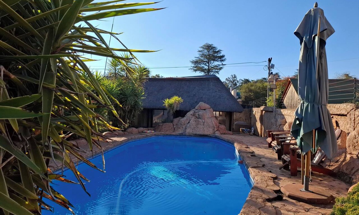 Nigel Bed & Breakfast | GerSan Oasis B&B: Your Peaceful Poolside Escape from City Life