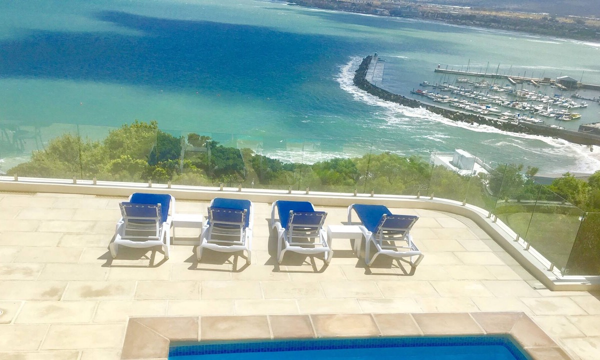 Mountainside Apartment | Stunning ocean views of False bay the harbour with Private pool