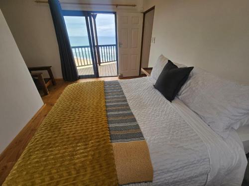 Ifafa Beach House | Wooden Cottage by the sea