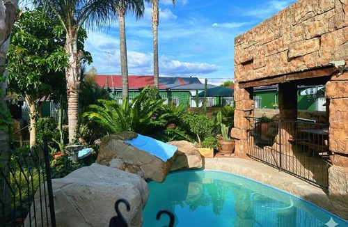 Greater Johannesburg Metropolitan Area House | Charming Holiday House in Roodepoort with Garden & Pool
