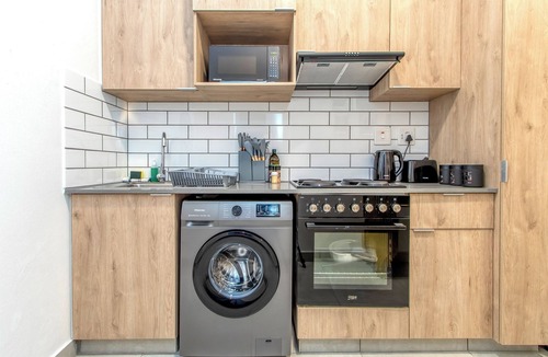 Greater Johannesburg Metropolitan Area Apartment | Chic 2BR in Illovo: Work, Play, Unwind