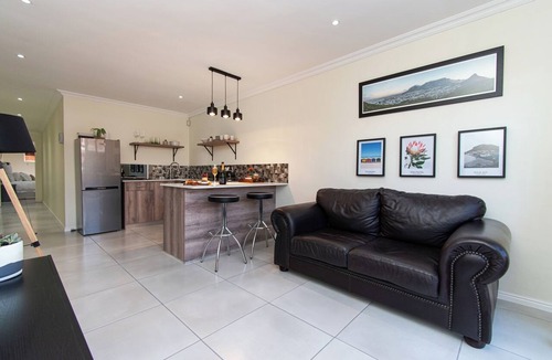 Muizenberg Apartment | Comfortable Living within walking distance to go swim, surf, dine or just relax