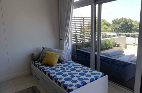 Plettenberg Bay Apartment | Cosmo Chic Holiday Rental walking distance to beaches, shops & restaurants