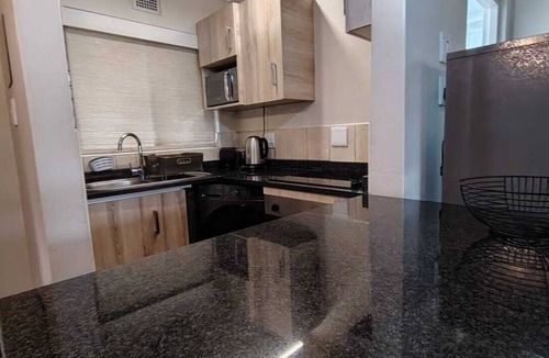 Shaka's Rock Ski Chalet | Cozy 1-bedroom chalet in charming Ballito with AC