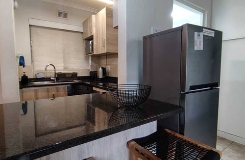 Shaka's Rock Ski Chalet | Cozy 1-bedroom chalet in charming Ballito with AC
