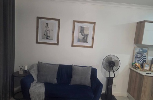 The Willows Apartment | Cozy 1-bedroom penthouse apartment in beautiful Pretoria with AC and gym