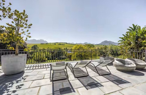 Stellenbosch Apartment | Enjoy the privacy of your own wood fired hot-tub, barbecue & breathtaking views.