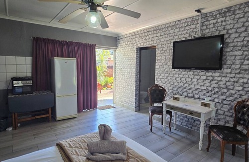 Nigel Bed & Breakfast | GerSan Oasis B&B: Your Peaceful Poolside Escape from City Life