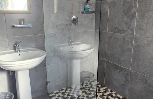 Nigel Bed & Breakfast | GerSan Oasis B&B: Your Peaceful Poolside Escape from City Life