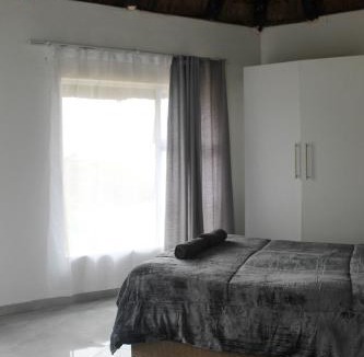 Mgxotyeni Hotel | Hole in the Wall - Unit H1