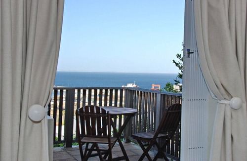 Simon's Town House | Luxury Coastal self-catering Living with Unforgettable False Bay Views.