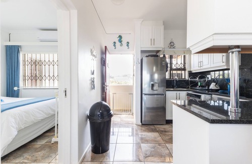Winklespruit Apartment | Luxury Ocean View Escape Apartment in Kingsburgh with AC and Private Rooftop