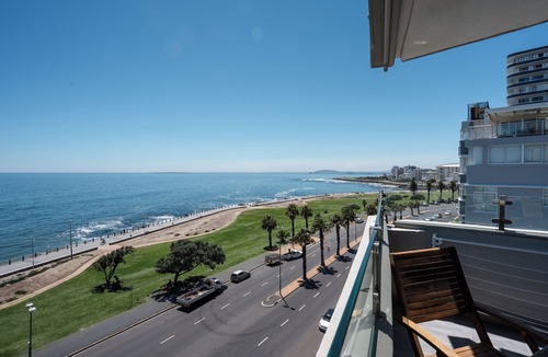 Three Anchor Bay Apartment | Modern Beachfront 3-bedroom apartment, mini gym, gas bbq, indoor fireplace.