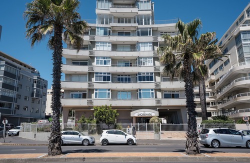 Three Anchor Bay Apartment | Modern Beachfront 3-bedroom apartment, mini gym, gas bbq, indoor fireplace.