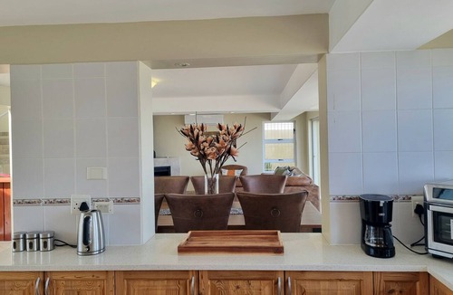 Gordons Bay Central House | Paradise Tide - 4-bedroom Beachfront house with AC in Gordon's Bay