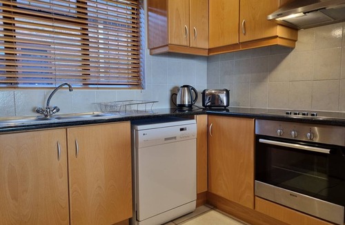 Gordons Bay Central Apartment | Perfect Sea View 2-bedroom apartment with AC on Gordon's Bay's Beach front