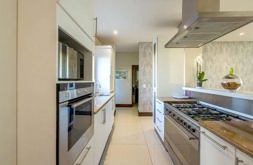 Sunset Beach House | Relax on the Fairway 3BR Golf Estate Getaway
