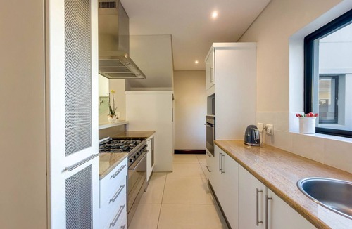 Sunset Beach House | Relax on the Fairway 3BR Golf Estate Getaway