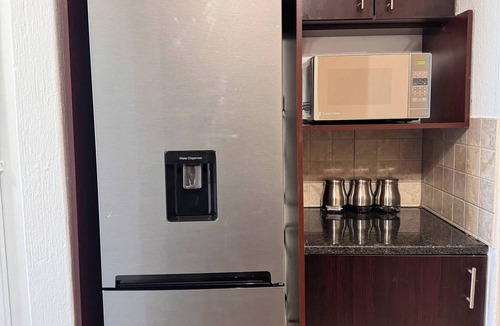 Greater Johannesburg Metropolitan Area Apartment | Stylish 1-Bed in Bryanston