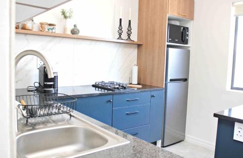 Sunset Beach Apartment | Sunset Stay - Garden Flat