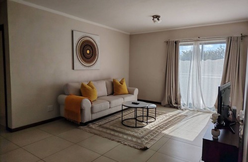 Greater Johannesburg Metropolitan Area Apartment | Tranquil 2-Bedroom Apartment in Jackal Creek Golf Estate