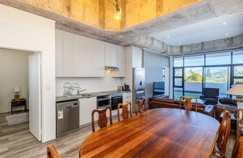 Milnerton Apartment | Urban Chic Retreat Stunning Mountain Views by CTHA