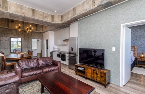 Milnerton Apartment | Urban Chic Retreat Stunning Mountain Views by CTHA