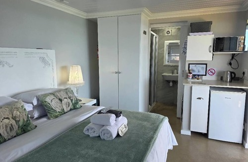 Dana Bay House | View on 42 - Protea Room - Small cozy room with ocean view