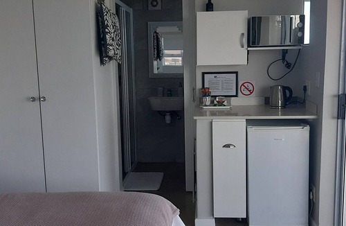 Dana Bay House | View on 42 - Protea Room - Small cozy room with ocean view