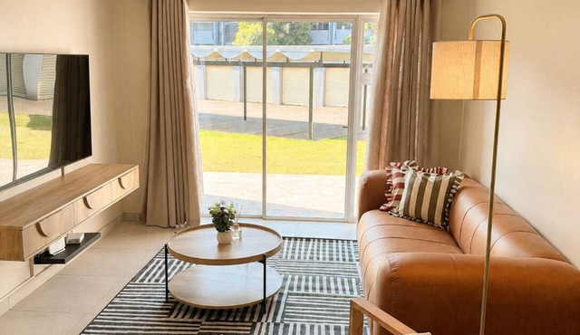19 @ Menlyn Place, a newly renovated, stylish apartment in a prime location. in Pretoria