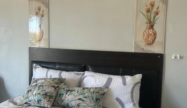 Amza guest room in Mogwase