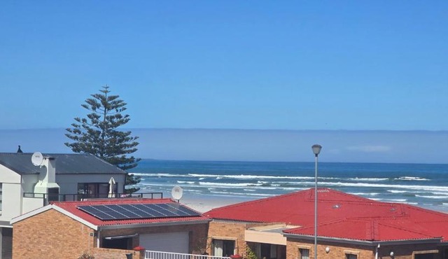 Coastal Bliss Steps from Beach