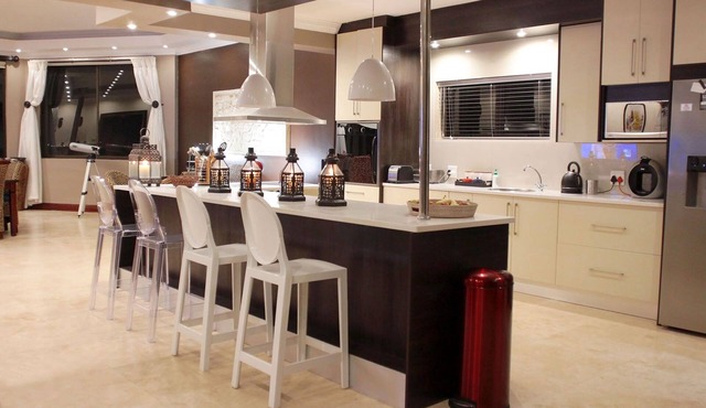 Luxurious 4 Bedroom Home with Ocean and Table Mountain Views in Bloubergstrand