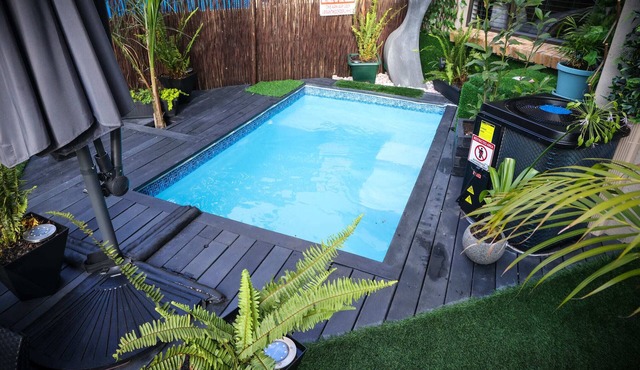 Luxury 2-Bedroom Apartment near OR Tambo with Private Garden & Heated Pool in Benoni