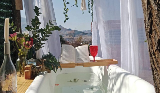 Romantic Clarens Getaway - Glamped Caravan with Braai & Fairy Bath in Clarens