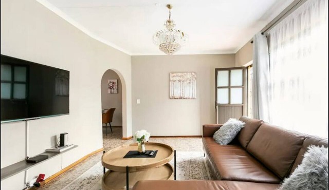 Self-check in property with a huge family yard in Alberton surbub area in Alberton