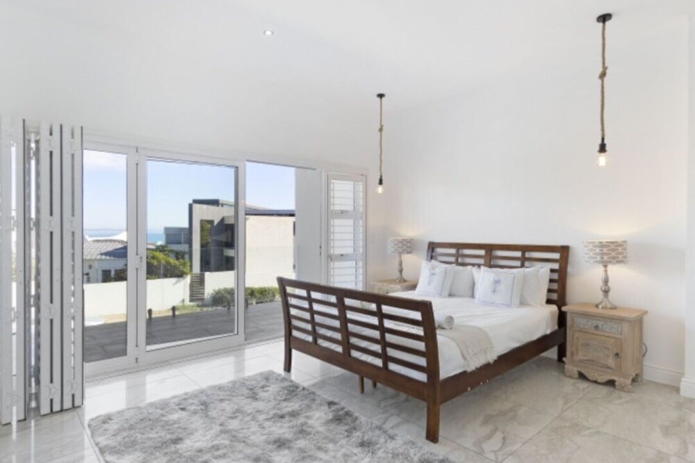 Bloubergstrand House | Beach Home with Panoramic Ocean and Table Mountain views in Cape Town