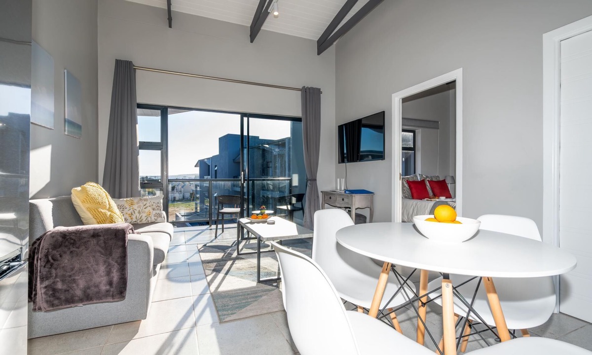 Mykonos Apartment | Stylish Urban Stay | Balcony | Braai Area