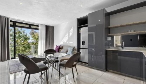 One-Bedroom Apartment with Balcony and City View