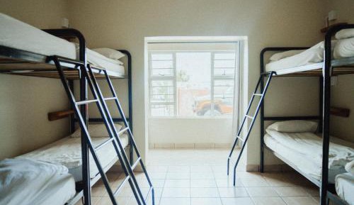 Single Bed in Dormitory Room