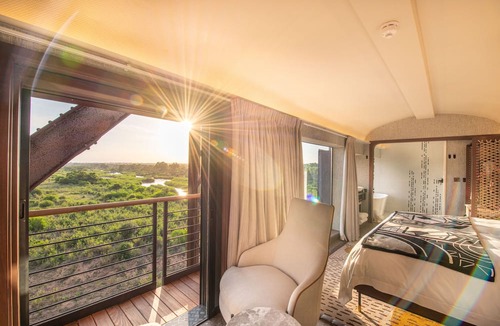 Skukuza Hotel | Kruger Shalati - Train on the Bridge and Garden Suites