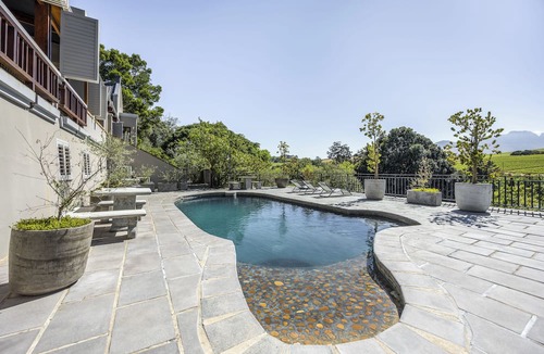 Stellenbosch Apartment | Enjoy the privacy of your own wood fired hot-tub, barbecue & breathtaking views.