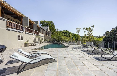 Stellenbosch Apartment | Enjoy the privacy of your own wood fired hot-tub, barbecue & breathtaking views.