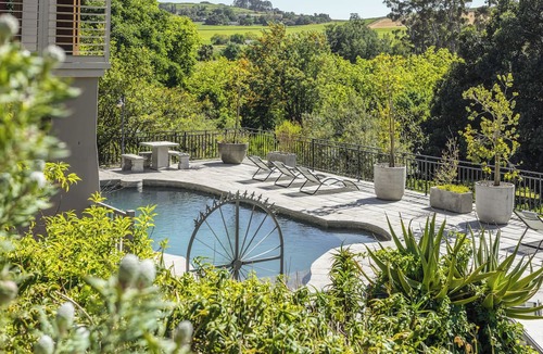 Stellenbosch Apartment | Enjoy the privacy of your own wood fired hot-tub, barbecue & breathtaking views.