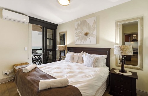 Strand Apartment | Beachfront Luxury 1,300 Sq Ft, Workspace, Air Con & False Bay Views