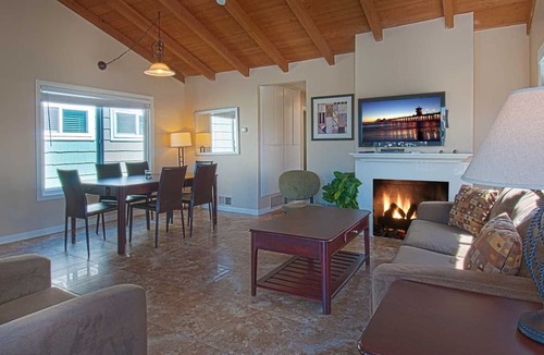 West Newport Condo | Fantastic upstairs unit just one house from the warm sand