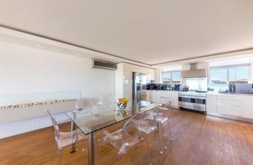 Lagoon Beach Apartment | Milnerton Beachfront 3Br Retreat With Hot Tub