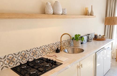 Salt Rock Apartment | CocoMo - Boutique Coastal Garden Studio - Walk to Beach - Private Pool and Fire Pit