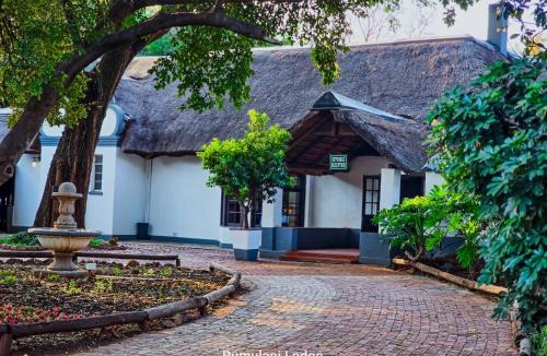 Roodeplaat Hotel | Phumulani Lodge Kameeldrift