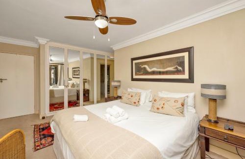 Three Anchor Bay Apartment | Bright and Stylish Beachfront Apartment